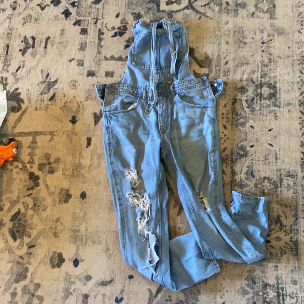 Denim distressed light washed overalls